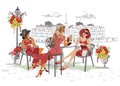 Fashion people in the restaurant. Street cafe in the old city. Girls in red dresses and hats drinking coffee at the table near the